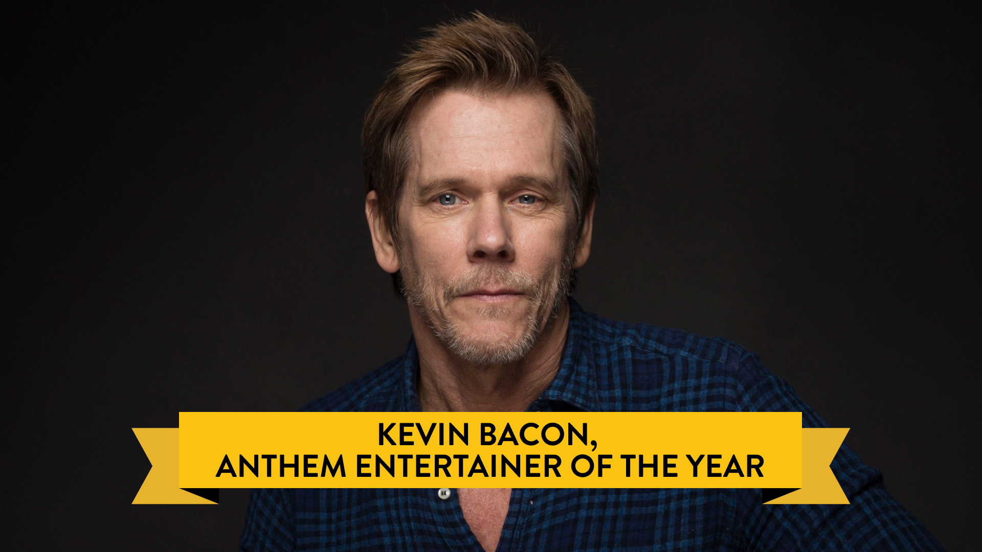 Image: a headshot of actor kevin bacon against black background. text reads: kevin bacon, anthem entertainer of the year